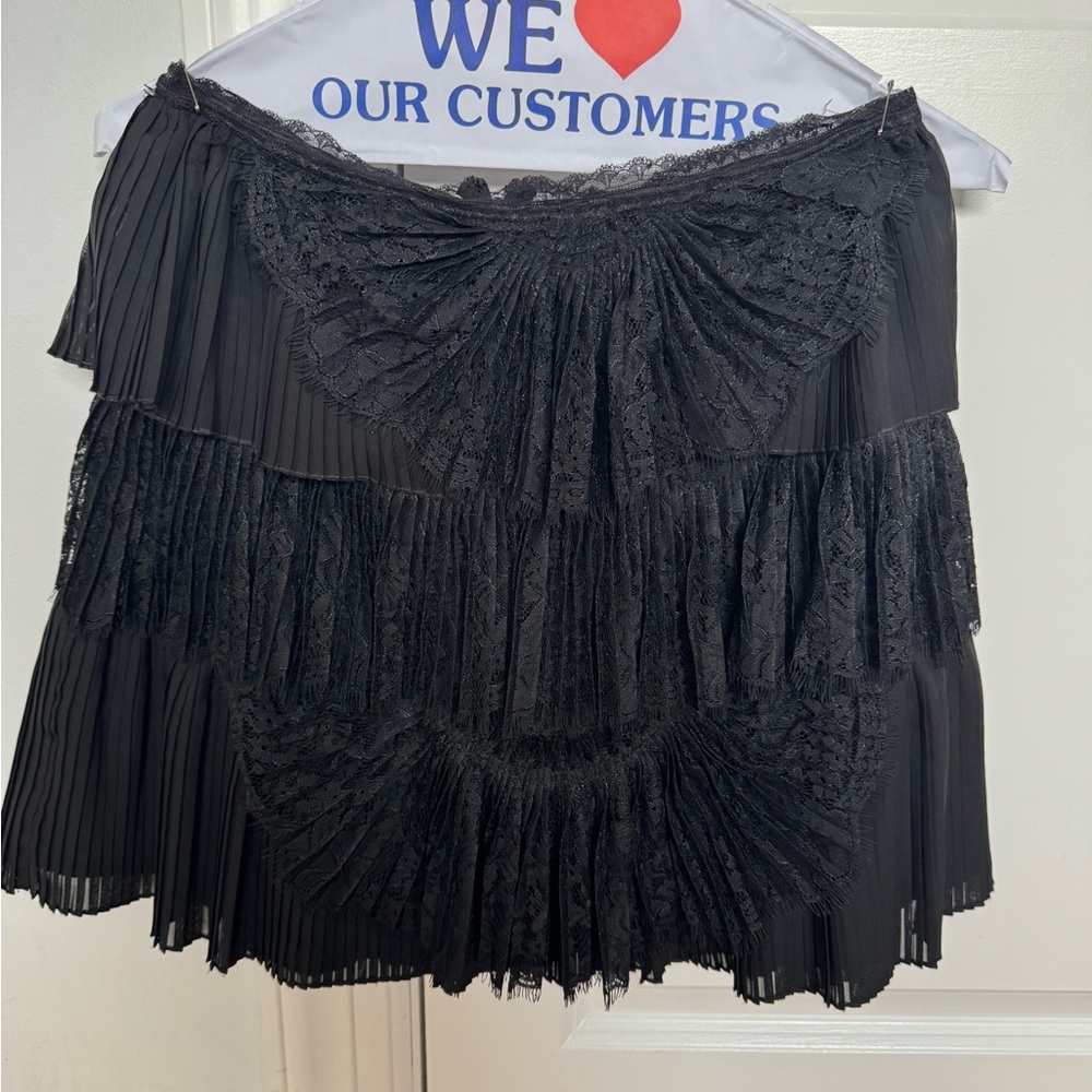 Alice and Olivia black lace mini skirt. Size 2.